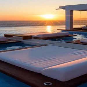 Greece Honeymoon Packages Cave Tagoo Mykonos Pool At Night1