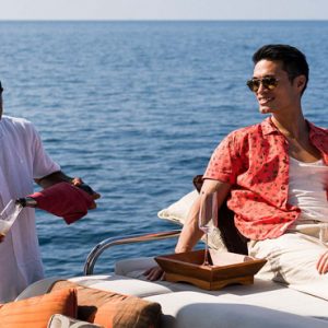 Maldives Honeymoon Packages Naladhu Private Island Maldives Couple On Yacht