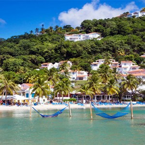 Windjammer Landing Villa Beach resort - Luxury Honeymoon St Lucia - hammocks in ocean