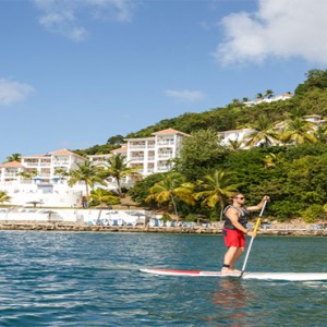 Windjammer Landing Villa Beach resort - Luxury Honeymoon St Lucia - paddle boarding