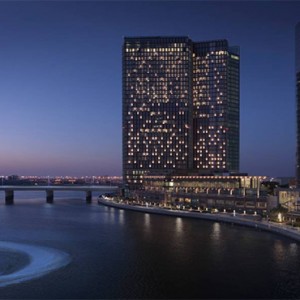 Four seasons Hotel Abu Dhabi at Al Maryah Island - Luxury Abu Dhabi honeymoon packages - hotel exterior at night