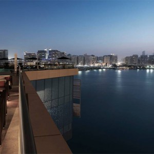 Four seasons Hotel Abu Dhabi at Al Maryah Island - Luxury Abu Dhabi honeymoon packages - rooftop terrace at night