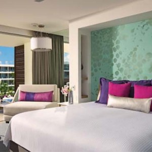 Breathless Riviera Cancun resort and spa - Luxury Mexico Honeymoon packages - Allure Junior Suite bedroom