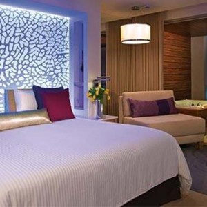 Breathless Riviera Cancun resort and spa - Luxury Mexico Honeymoon packages - Xhale Club Junior Suite bedroom