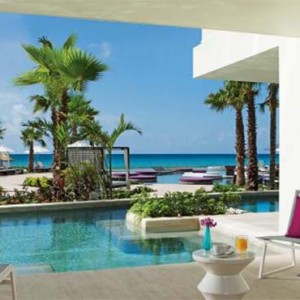 Breathless Riviera Cancun resort and spa - Luxury Mexico Honeymoon packages - Xhale Club Junior Suite swimout ocean front terrace