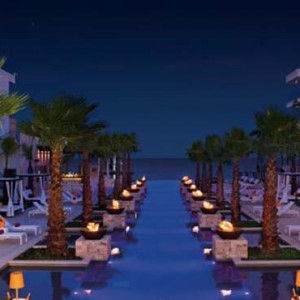 Breathless Riviera Cancun resort and spa - Luxury Mexico Honeymoon packages - pool at night