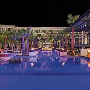 Breathless Riviera Cancun resort and spa - Luxury Mexico Honeymoon packages - pool at night1