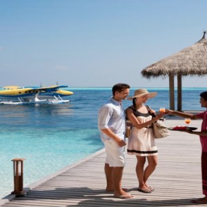 Vilamendhoo Island resort and spa - Luxury Maldives Honeymoon Packages - welcome on the jetty