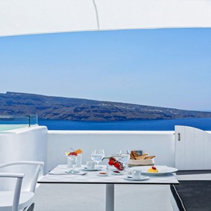 Charisma Suites Santorini - Luxury Greece Honeymoon packages - breakfast with a view