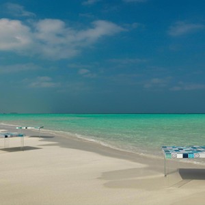 Cocoon Maldives - Luxury Maldives Honeymoon Packages - dining on beach