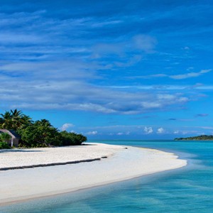 Cocoon Maldives - Luxury Maldives Honeymoon Packages - edge of beach