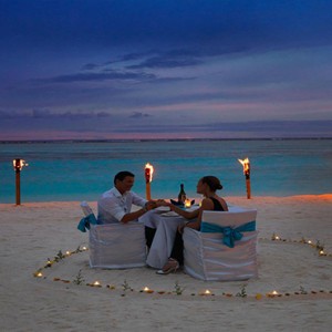 Cocoon Maldives - Luxury Maldives Honeymoon Packages - private dining on beach