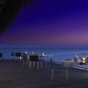 Cocoon Maldives - Luxury Maldives Honeymoon Packages - restauant at sunset