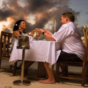 Acajou Beach Resort - Luxury Seychelles Honeymoon Packages - Romantic dining on the beach