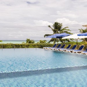 Acajou Beach Resort - Luxury Seychelles Honeymoon Packages - pool
