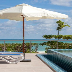 Acajou Beach Resort - Luxury Seychelles Honeymoon Packages - relax by the pool