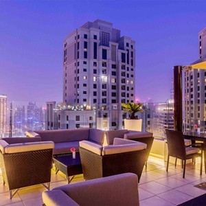 Hilton Dubai The Walk - Luxury Dubai Honeymoon Packages - rooftop terrace at night