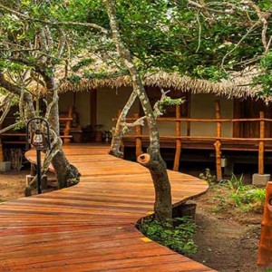 Uga Chena Huts Yala - Luxury Sri Lanka Honeymoon packages - cabin exterior walkway