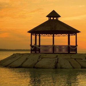 Jamaica Honeymoon Packages Secrets St James Montego Bay Wedding Couple Gazebo At Sunset