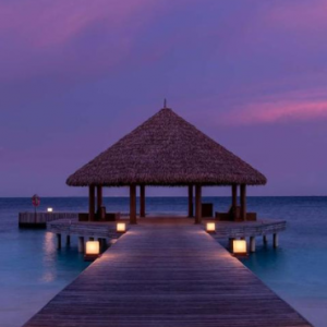 Dhawa Ihuru Maldives Maldives Honeymoon Packages Arrival Jetty At Sunset