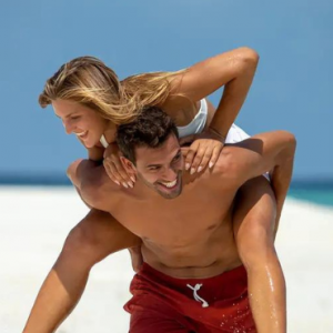 Dhawa Ihuru Maldives Maldives Honeymoon Packages Couple On Beach (1)