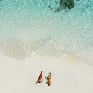 Dhawa Ihuru Maldives Maldives Honeymoon Packages Couple On Beach