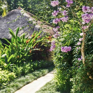 Four Seasons Bali at Sayan - Luxury Bali Honeymoon Packages - Riverfront One bedroom villa pathway