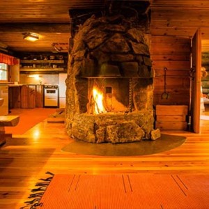 Kakslauttanen Arctic Resort - Luxury Finland Honeymoon Packages - Log Cabins cabin fire