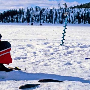 Kakslauttanen Arctic Resort - Luxury Finland Honeymoon Packages - ice fishing