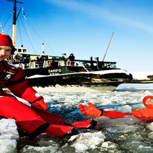 Kakslauttanen Arctic Resort - Luxury Finland Honeymoon Packages - ice swimming