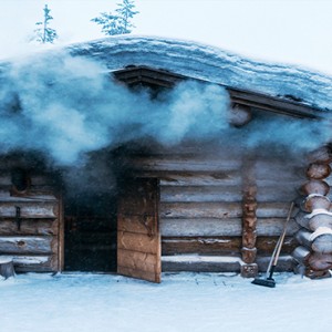 Kakslauttanen Arctic Resort - Luxury Finland Honeymoon Packages - smoke sauna exterior
