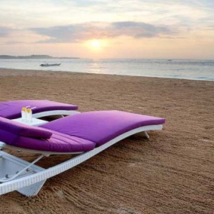 Amarterra Villas Bali Nusa Dua - Luxury Bali Honeymoon Packages - sun loungers on beach