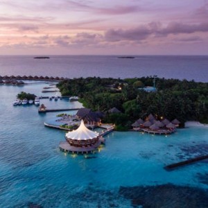 Baros Maldives - Luxury Maldives Honeymoon Packages - Aerial view at sunset
