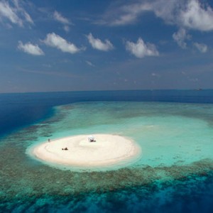 Baros Maldives - Luxury Maldives Honeymoon Packages - aerial view of sandbank