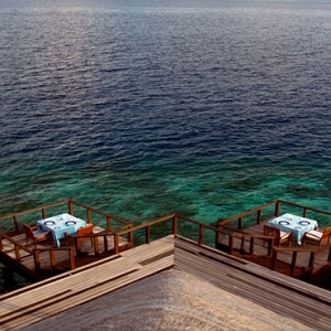 Coco Bodu Hithi - Luxury Maldives Honeymoon Packages - Aqua restaurant exterior dining