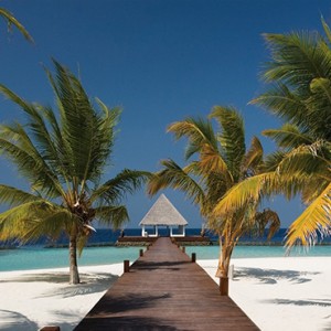 Coco Bodu Hithi - Luxury Maldives Honeymoon Packages - Beach area