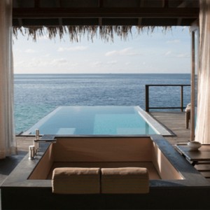 Coco Bodu Hithi - Luxury Maldives Honeymoon Packages - Escape Water Villa bathroom with a view