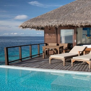 Coco Bodu Hithi - Luxury Maldives Honeymoon Packages - Escape Water Villa deck with pool