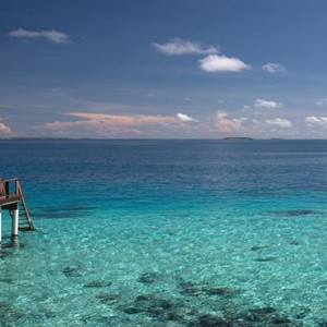 Coco Bodu Hithi - Luxury Maldives Honeymoon Packages - Escape Water Villa exterior lagoon