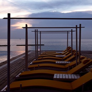 Coco Bodu Hithi - Luxury Maldives Honeymoon Packages - Latitude pool view at night