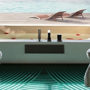 Coco Bodu Hithi - Luxury Maldives Honeymoon Packages - Spa massage room