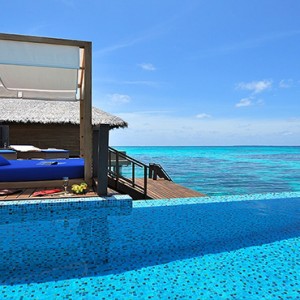 Coco Bodu Hithi - Luxury Maldives Honeymoon Packages - women in pool