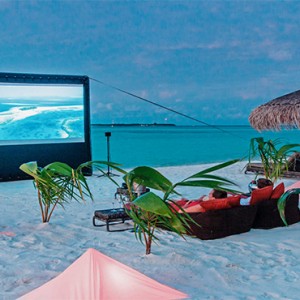 Constance Moofushi - Luxury Maldives Honeymoon Packages - Beach Cinema