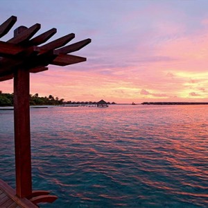 Constance Moofushi - Luxury Maldives Honeymoon Packages - Indian ocean sunsets