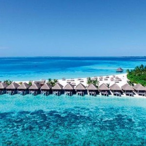 Constance Moofushi - Luxury Maldives Honeymoon Packages - Side View of water villas