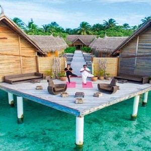 Constance Moofushi - Luxury Maldives Honeymoon Packages - Spa yoga