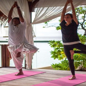 Constance Moofushi - Luxury Maldives Honeymoon Packages - Yoga