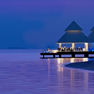 Diamonds Athuruga - Luxury Maldives Honeymoon Packages - over water restaurant