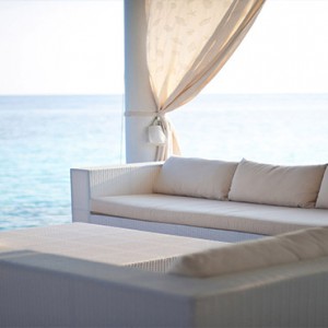 Diamonds Athuruga - Luxury Maldives Honeymoon Packages - relaxing seat on deck