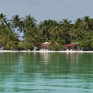 Diamonds Athuruga - Luxury Maldives Honeymoon Packages - view of beach villas1